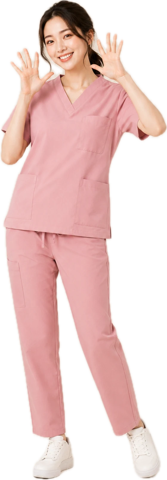 A woman wearing a SUB. scrub set in blush pink