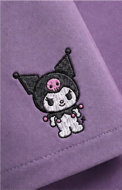 Kuromi character embroidered on a scrub sleeve